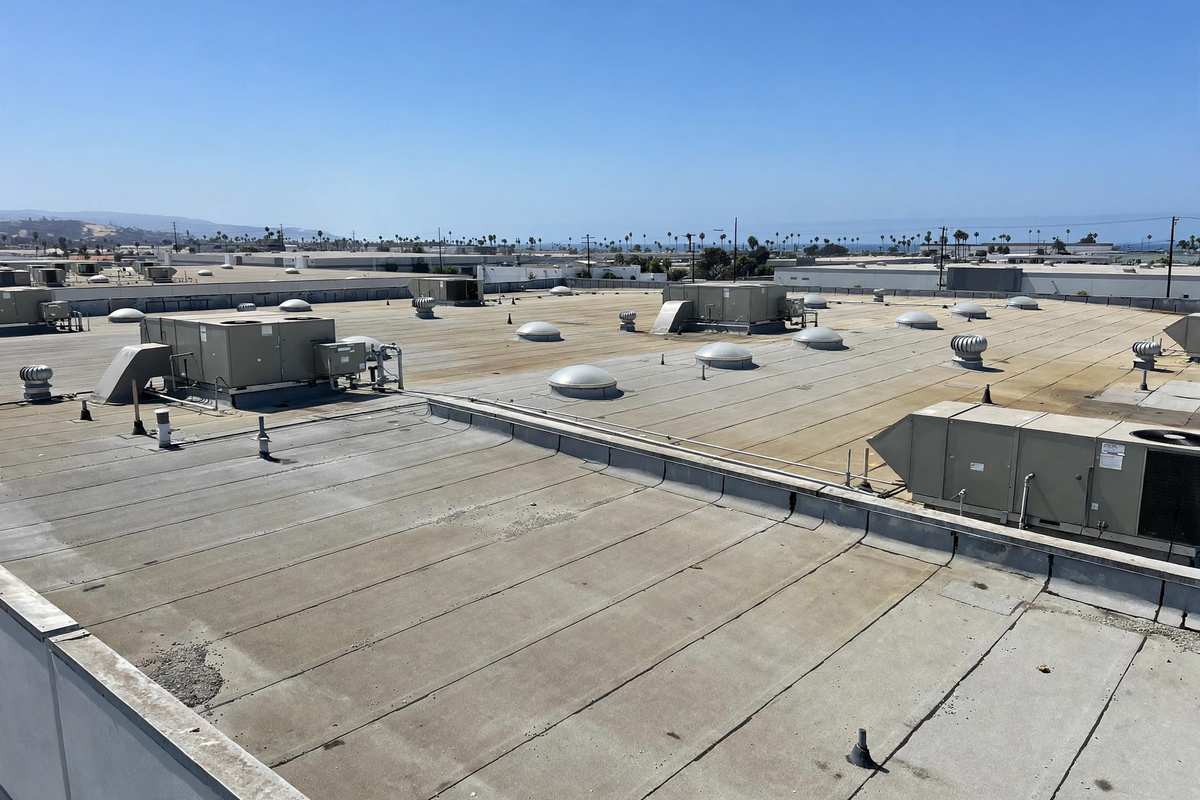 Roof Replacement in Westchester, CA — Roof Replacement crew at work on a coastal California roof